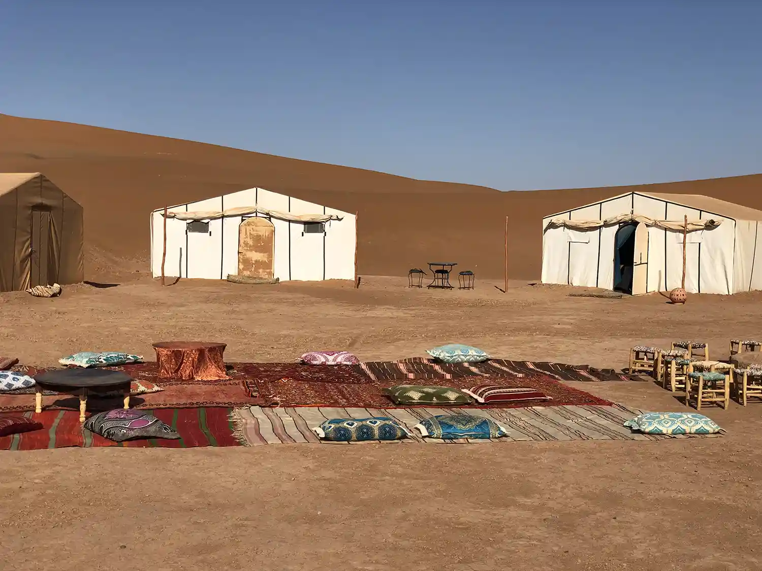 Desert camp surrounded by Erg Chigaga dunes near Foum Zguid