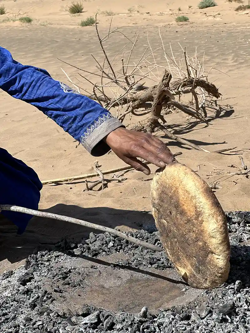 Traditional nomadic sandbread experience in the Erg Chigaga Sahara